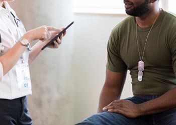 psychiatrist talking to patient 